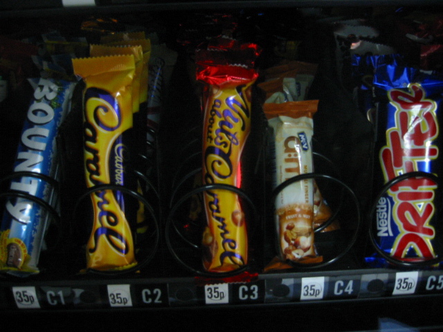 Vending machine drawer of chocolate bars priced 35p