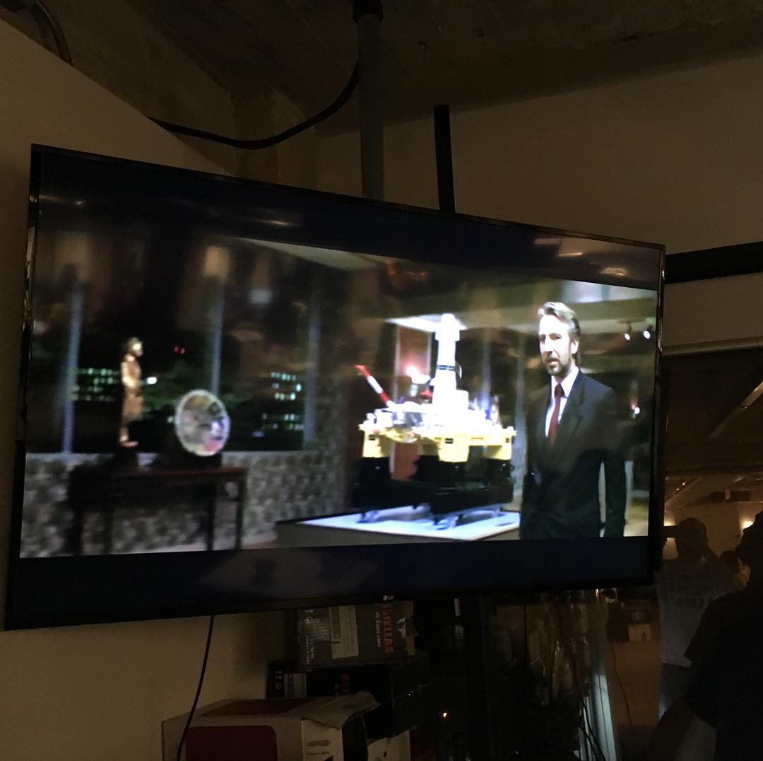 Paying homage to the late Alan Rickman playing Die Hard at happy hour