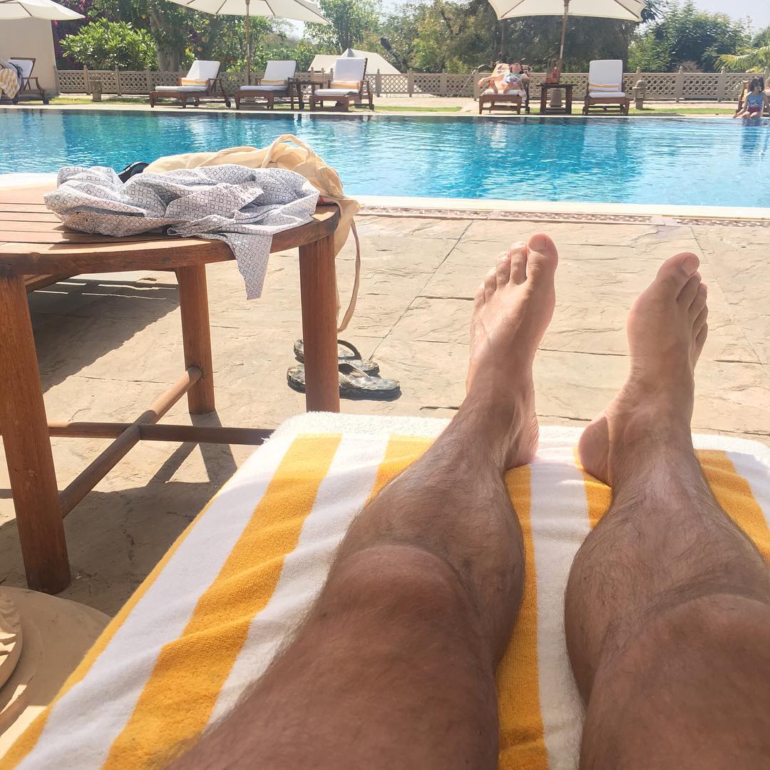 Chilling by the pool before the trip to Mumbai this afternoon