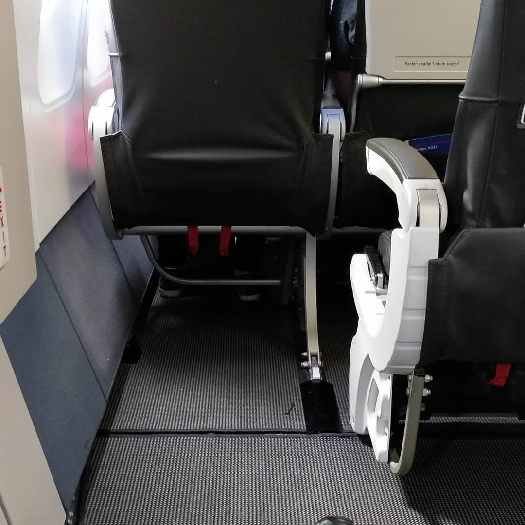 It's like a pretend upgrade. I am in charge of opening a door if there is an emergency though as a trade off for all this space. Seat 9A for the win (image 1 of 2)