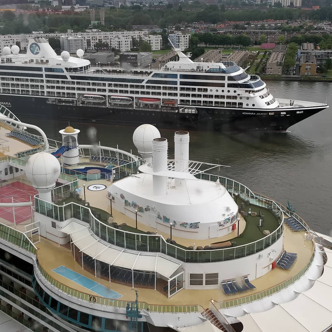 Amsterdam is busy today. Two ships parked and another arriving