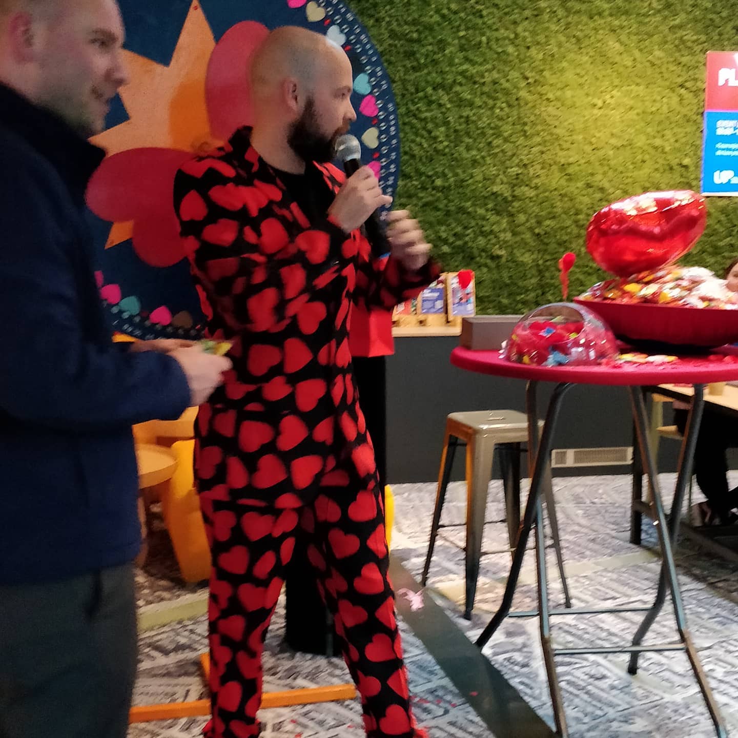 Spinning the valentine's wheel at the office. I've won a raffle ticket with a chance to win lunch for two.