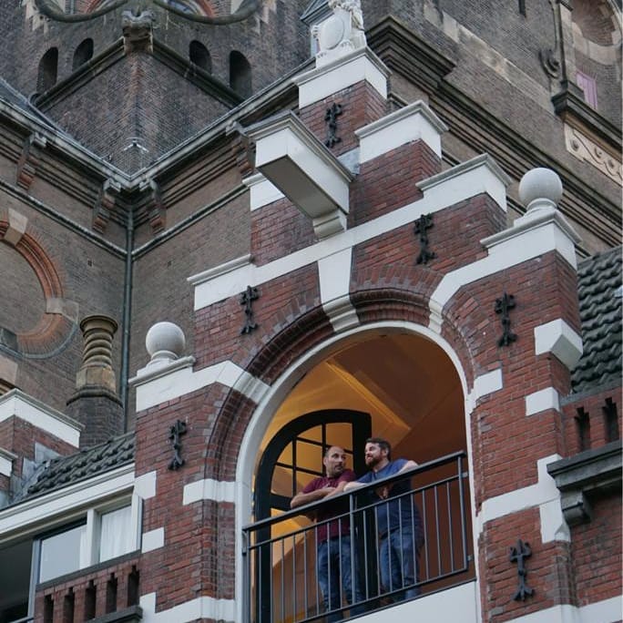 One of our friends in Amsterdam has been doing a portrait series of Amsterdammers in #lockdown Thanks @funzies for doing this it's great to see people ? #amsterdamshots #quarantine #portrait #covid #amsterdam #architecture #church #kerk #quarantaine