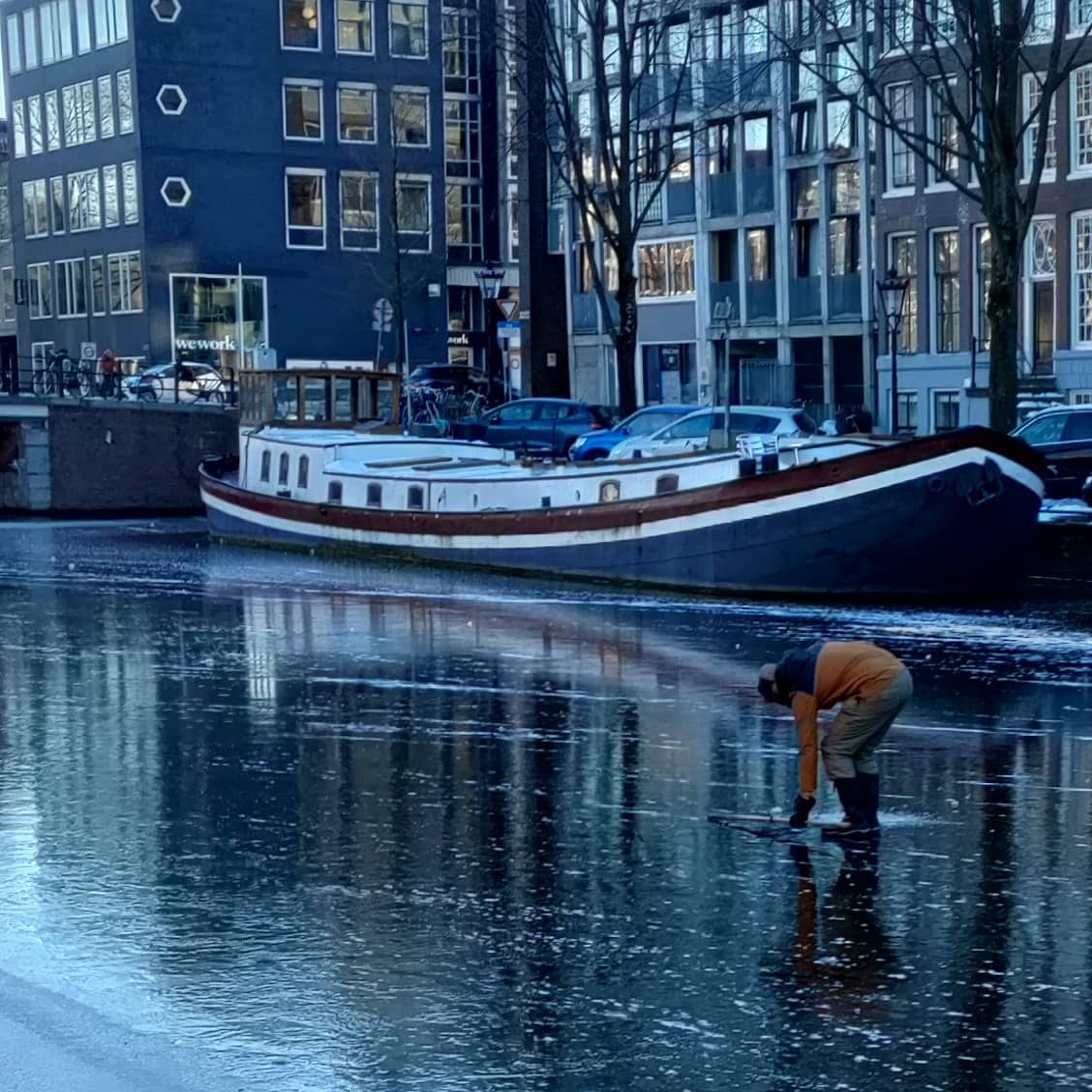 Testing the ice thickness for skating.